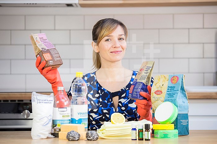 Woman using eco cleaning products.