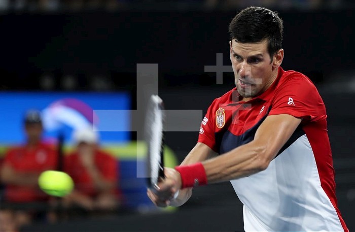 (200104) -- BRISBANE, Jan. 4, 2020 (Xinhua) -- Novak Djokovic of Serbia returns a shot during the ATP Cup Group A match against Kevin Anderson of South Africa in Brisbane, Australia, on Jan. 4, 2020. (Xinhua/Bai Xuefei) Xinhua News Agency / eyevine  Contact eyevine for more information about using this image: T: +44 (0) 20 8709 8709 E: info@eyevine.com http://www.eyevine.com . (SP)AUSTRALIA-BRISBANE-TENNIS-ATP CUP-DAY 2