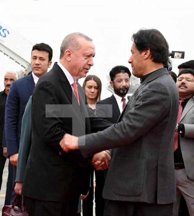 (200214) -- ISLAMABAD, Feb. 14, 2020 (Xinhua) -- Photo released by Pakistan’s Press Information Department (PID) shows Pakistani Prime Minister Imran Khan (R) shaking hands with Turkish President Recep Tayyip Erdogan upon his arrival in Islamabad, Pakistan, Feb. 13, 2020. Turkish President Recep Tayyip Erdogan on Thursday arrived in Pakistan for a two-day visit. (PID/Handout via Xinhua) Xinhua News Agency / eyevine  Contact eyevine for more information about using this image: T: +44 (0) 20 8709 8709 E: info@eyevine.com http://www.eyevine.com . PAKISTAN-ISLAMABAD-TURKISH PRESIDENT-VISIT