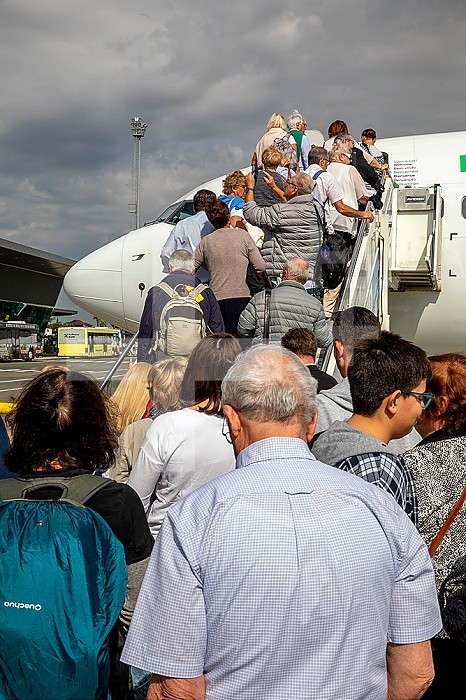 Boarding a low-cost flight at Tirana airport, Albania.