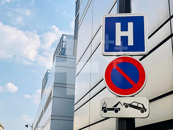 Sign announcing a parking ban in front of a Hospital, Paris, Ile-de-France, France.
