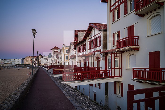 Promenade Jacques Thibaud boardwalk   in front of the Grande Plage beach of Saint Jean de Luz, fishing town at the mouth of the Nivelle river, in southwest France’s Basque country