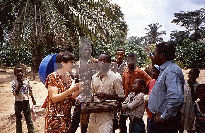 This historic 1997 image was created during an investigation into an outbreak of monkeypox, which took place in the Democratic Republic of Congo (DRC), from 1996 to 1997, formerly Zaire. Pictured were American zoologist Delphi Messinger and Dr LV Okito as they purchased a squirrel from one of the local villagers, which was then tested for the presence of the smallpox virus of the monkey. CDC / Brian WJ Mahy