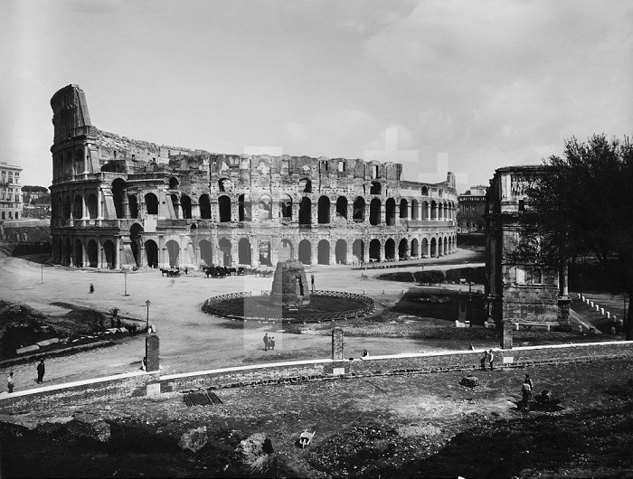 ROME: COLOSSEUM. /nThe Colosseum, Meta Sudans and Arch of Titus in Rome. Photograph, 19th century.