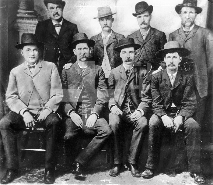 PEACE COMMISSION. /nThe Dodge City Peace Commission in the late 1870s. Seated, left to right: Charlie Bassett, Wyatt Earp, Frank McLain, and Neal Brown. Standing, left to right: W.H. Harris, Luke Short, Bat Masterson, and W.F. Petillon.