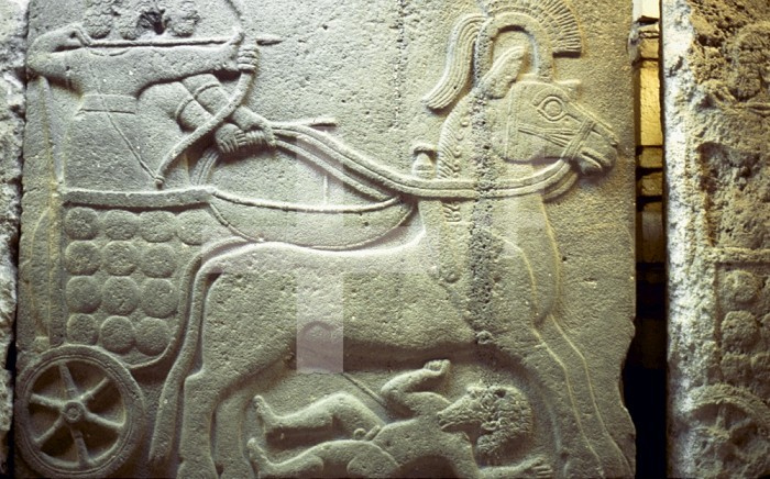 HITTITE CHARIOT. /nNeo-Hittite stone relief of a war chariot riding over a defeated enemy, 8th century B.C.