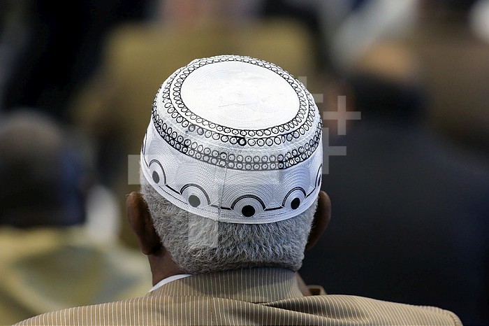 Eid al-Adha, also called the Feast of Sacrifice is the second of two religious holidays celebrated by Muslims worldwide each year. Kufi cap.